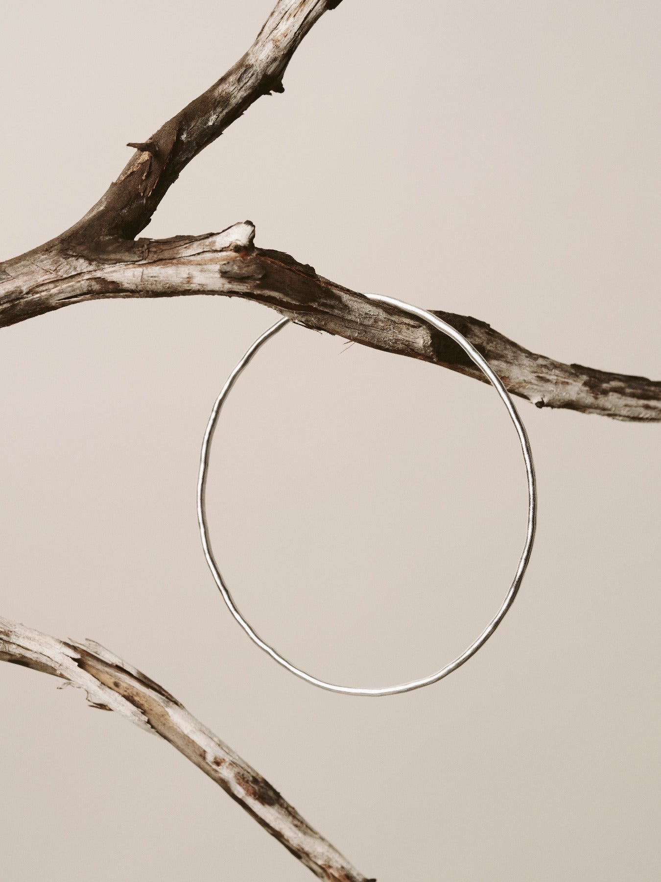 Hammered bangle bracelet made with recycled silver.
