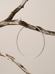 Hammered bangle bracelet made with recycled silver.