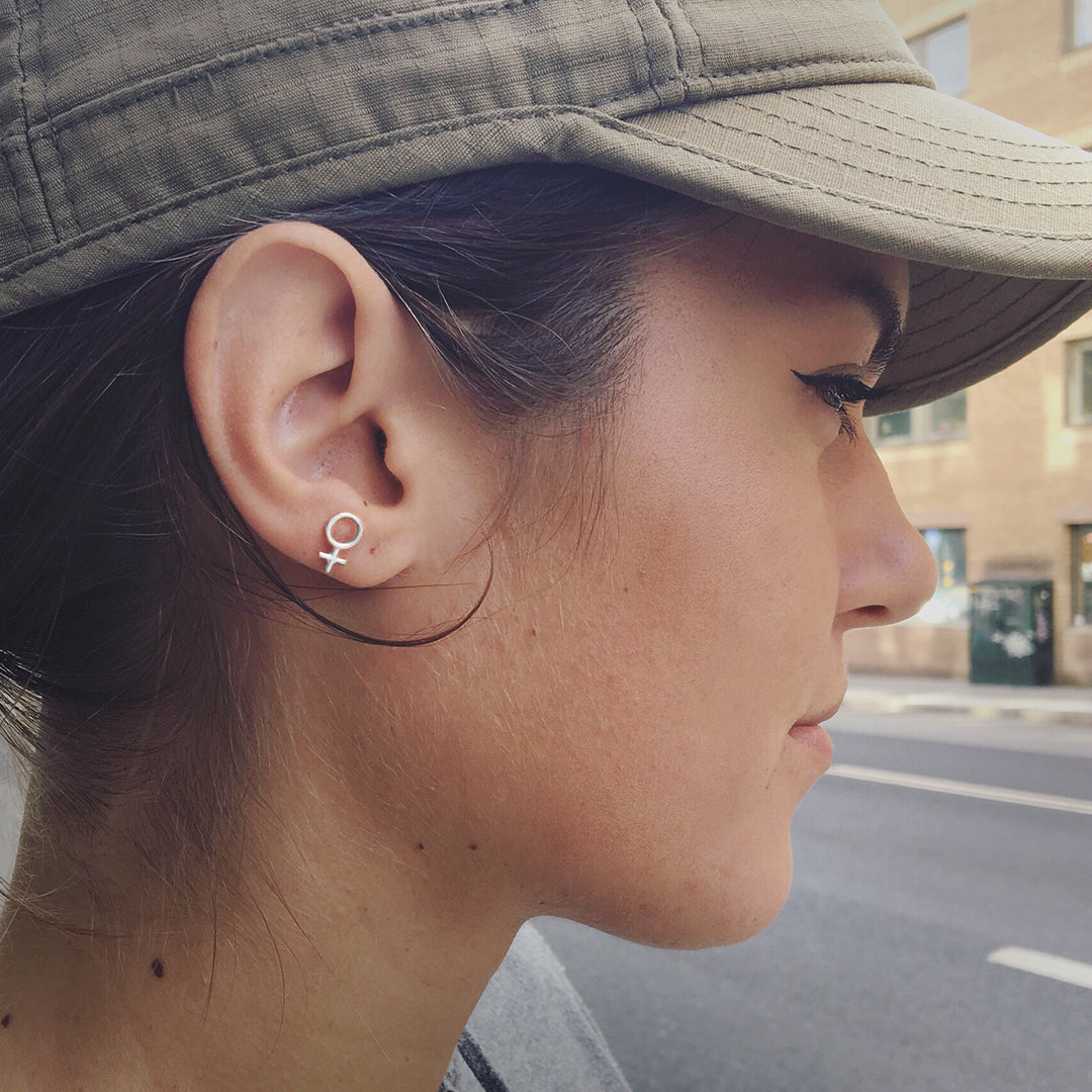 Minna Tiny Feminist Hoop Earring Silver or Bronze